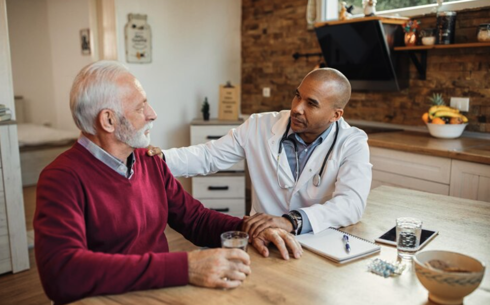 Doctor speaking with patient