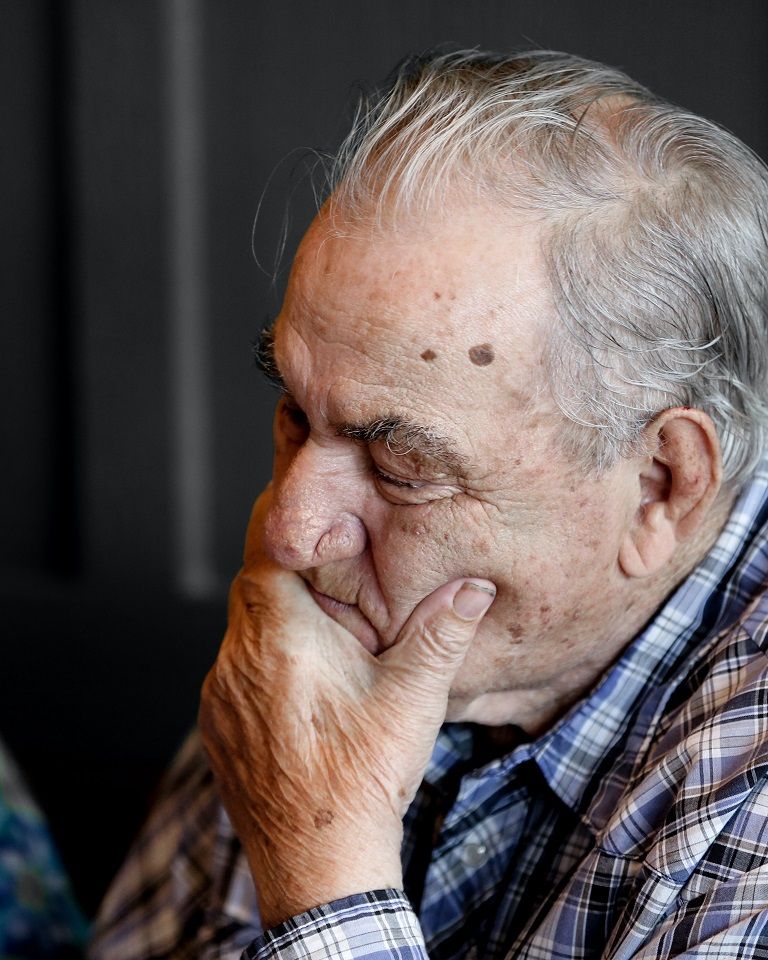Person showing signs of sadness or frustration